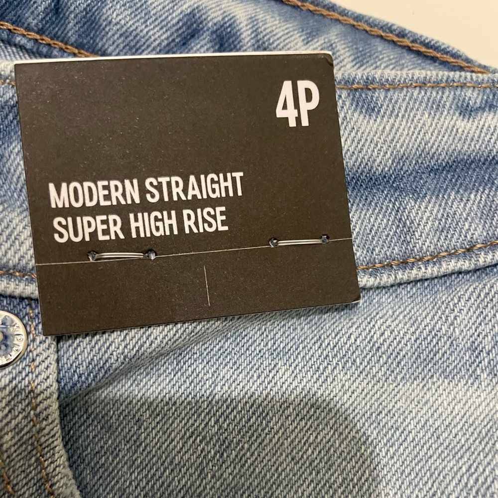 NWT. Express super high waisted light wash modern straight jeans.